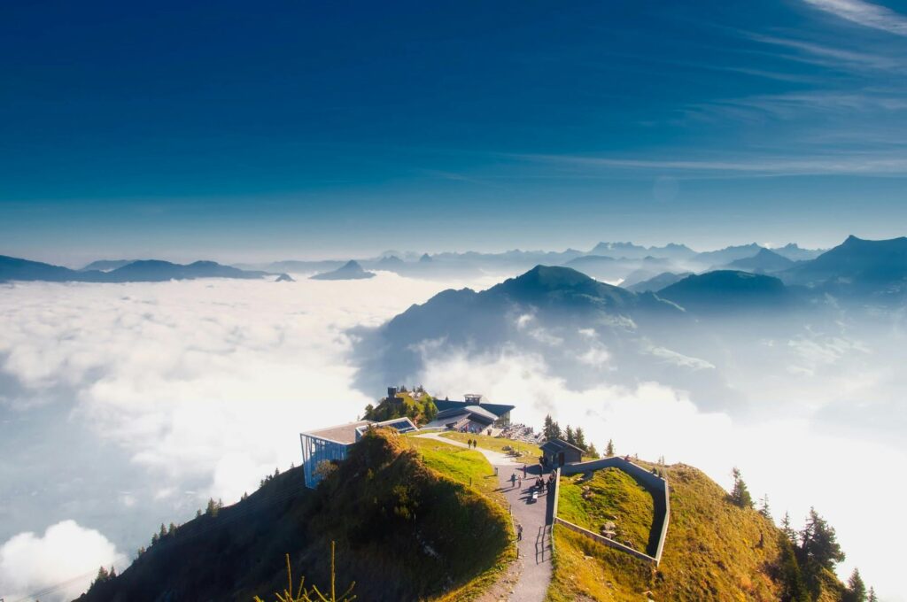 pexels-photo-415958-415958-1 A stunning view from Stanserhorn in Switzerland, showcasing clouds, mountains, and scenic landscapes.